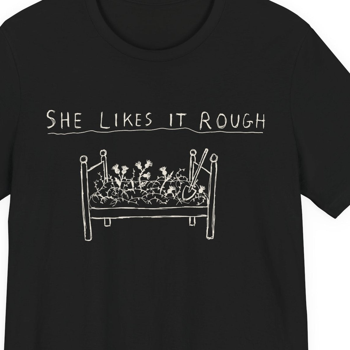 She Likes It Rough — close-up of the print on a black tee