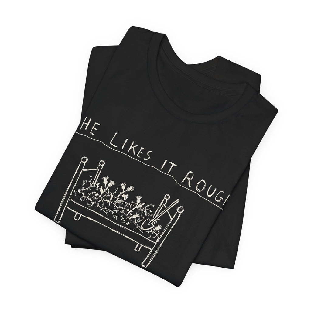 She Likes It Rough — Black tee, folded