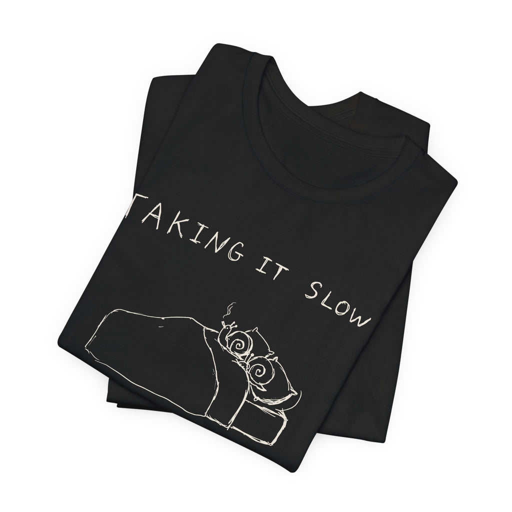 Taking It Slow — Black tee, folded