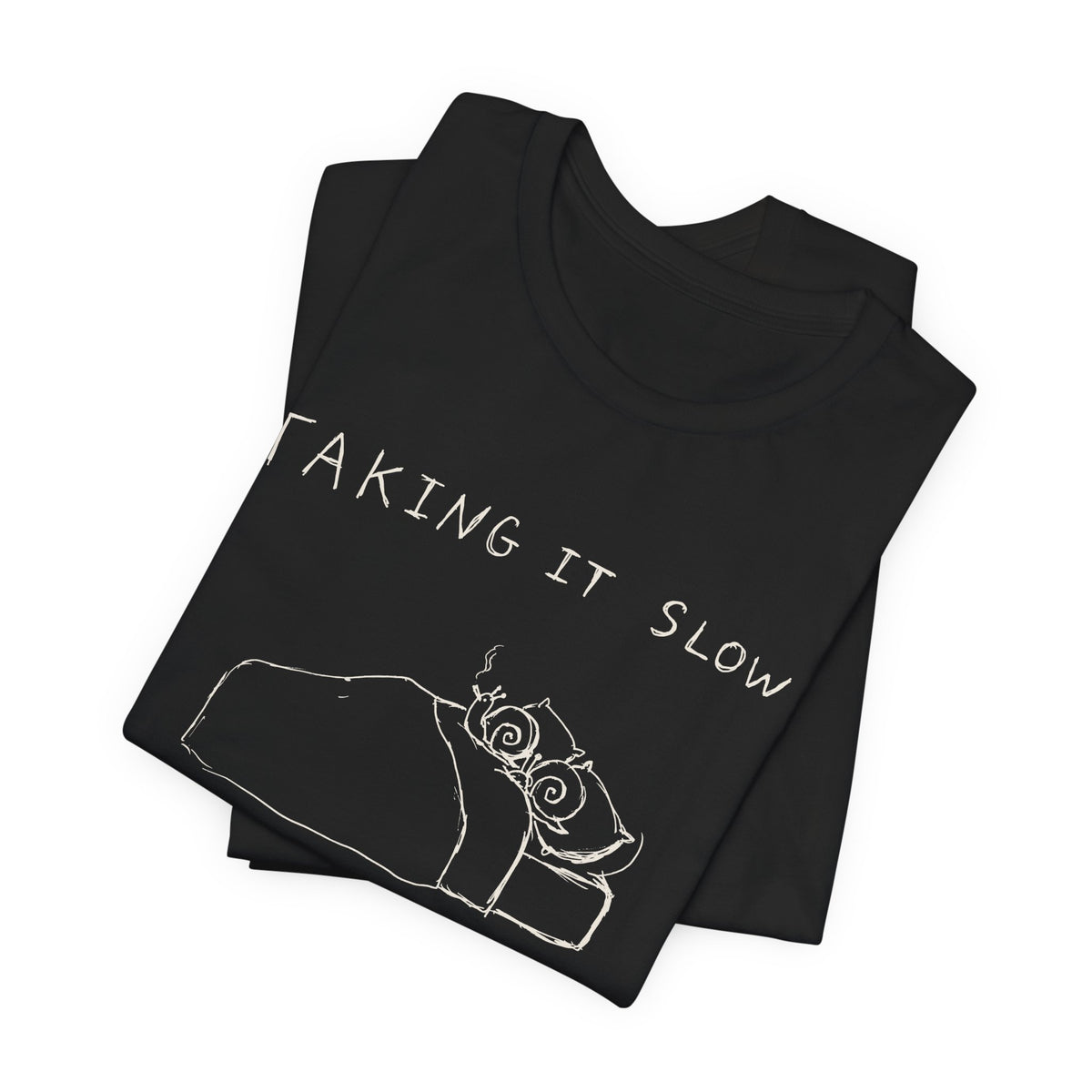 Taking It Slow — Black tee, folded
