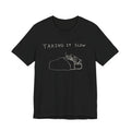 Taking It Slow — Black tee, front