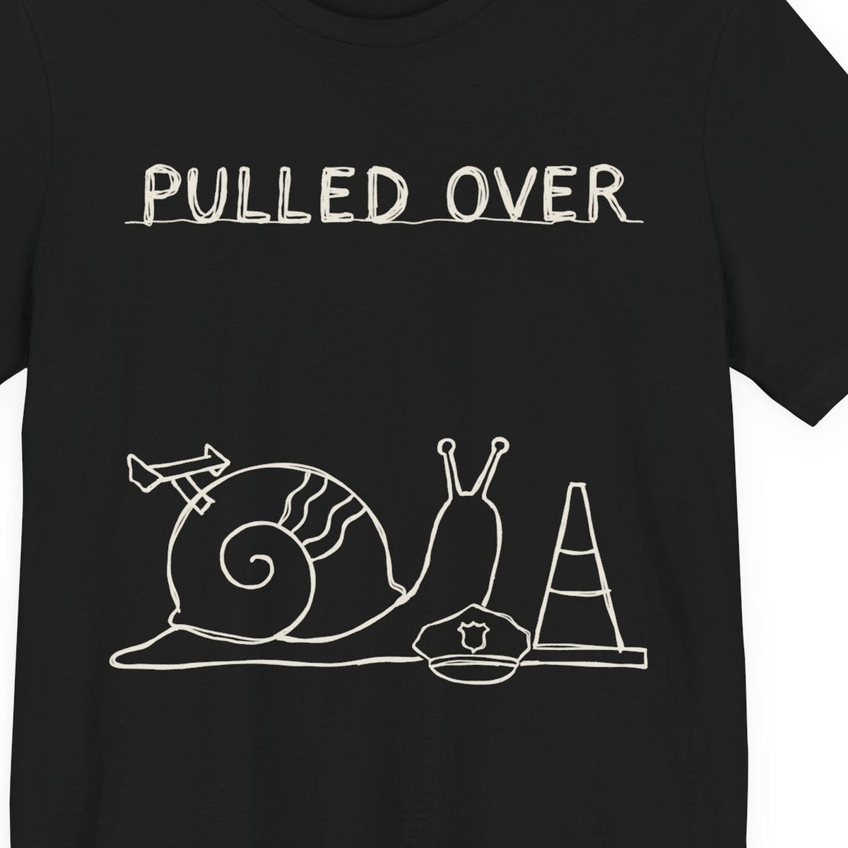 Pulled Over — close-up of the print on a black tee