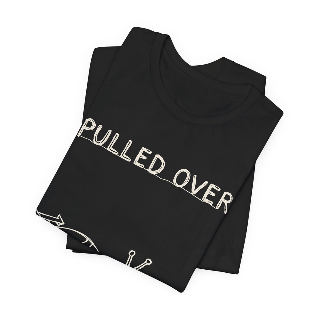 Pulled Over — Black tee, folded
