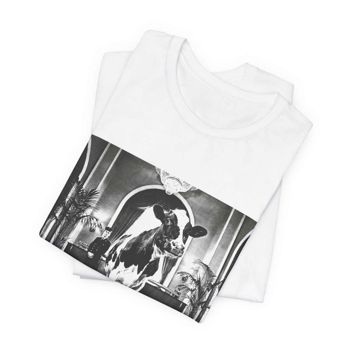 Lobby Cow — White tee, folded