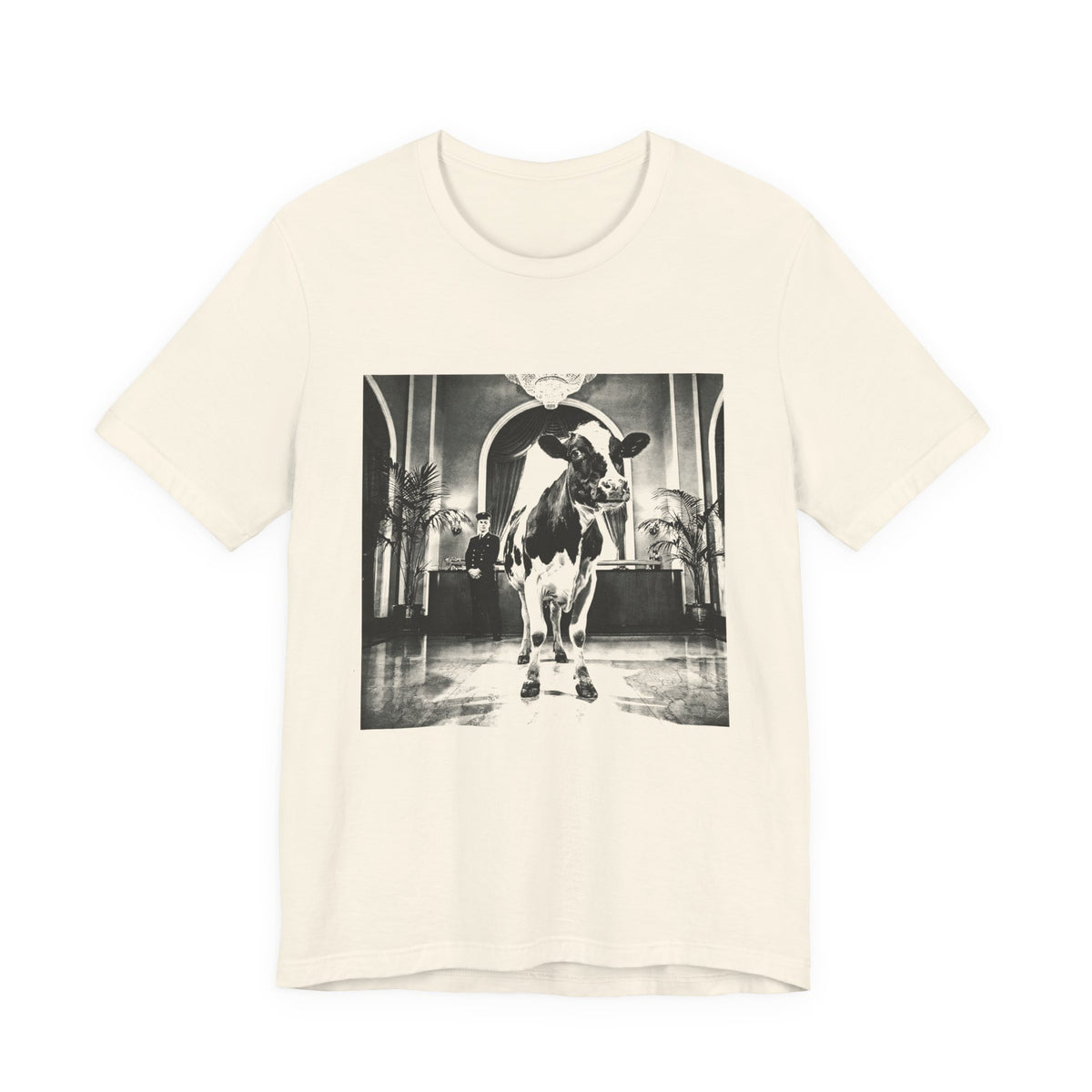 Lobby Cow — Natural tee, front